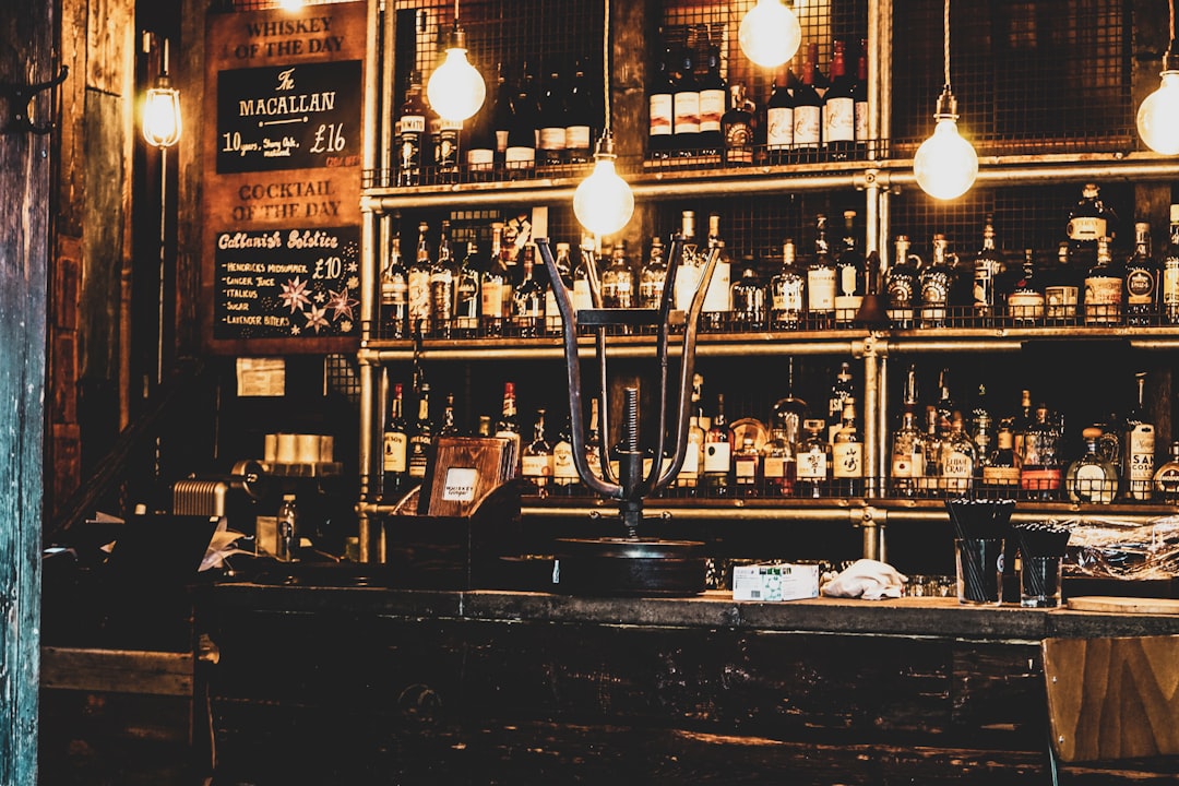 Traditional London pub interior with warm amber lighting