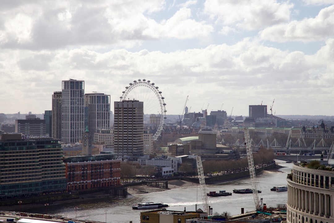 London Eye and Tower of London seen from the Thames