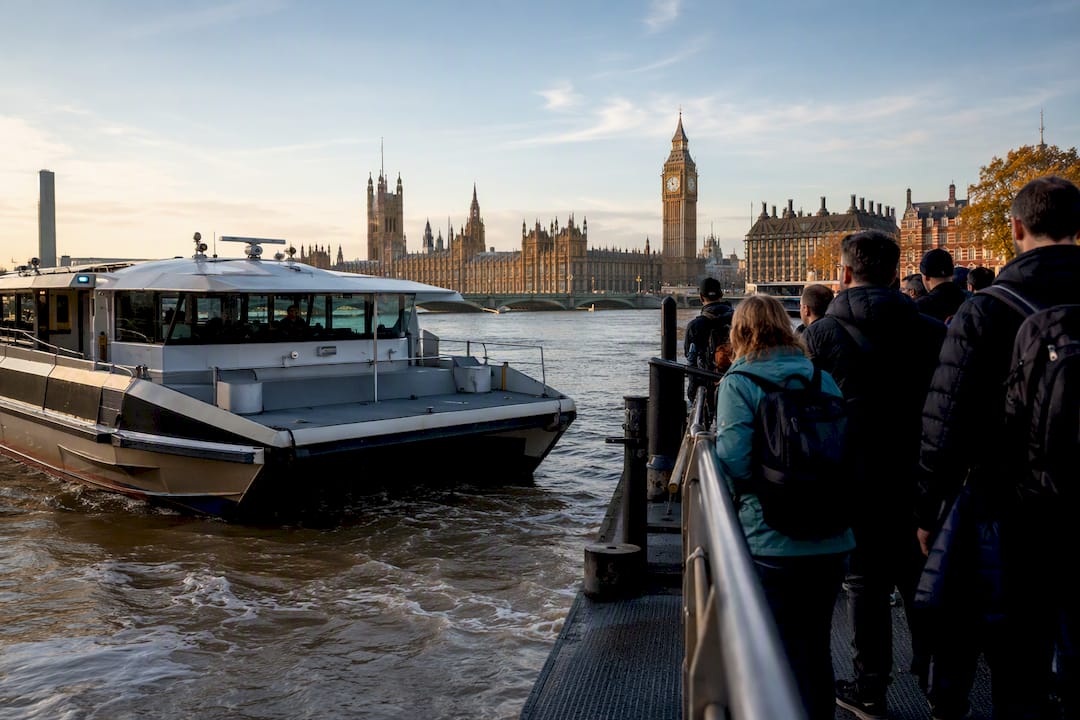 River boat approaching a London pier