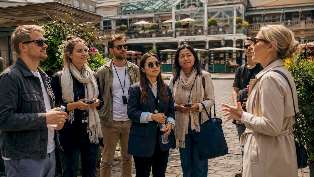 Guided walking tour group exploring Covent Garden
